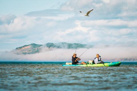 Experience the serene and picturesque landscapes of Michigan's diverse fishing destinations during spring.