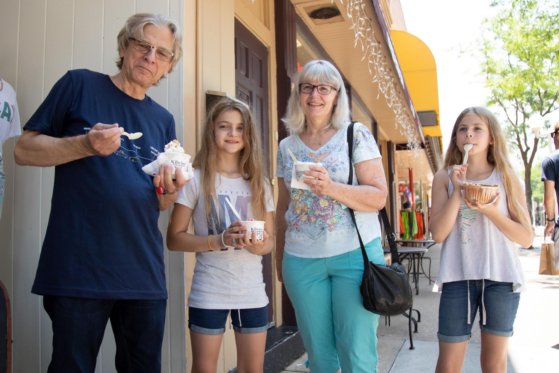 Family fun in Michigan includes enjoying delicious ice cream on a sunny day.