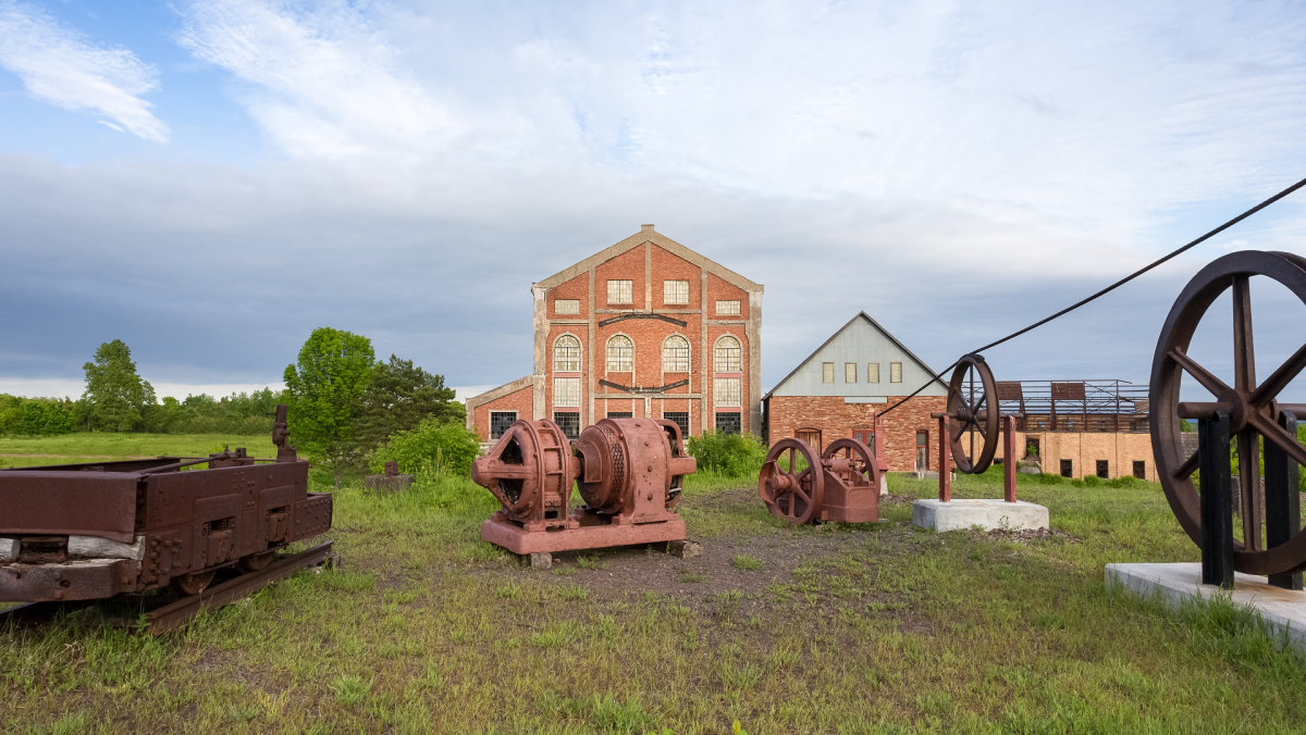 Explore the rich mining and timber history that shaped Michigan's cultural landscape.
